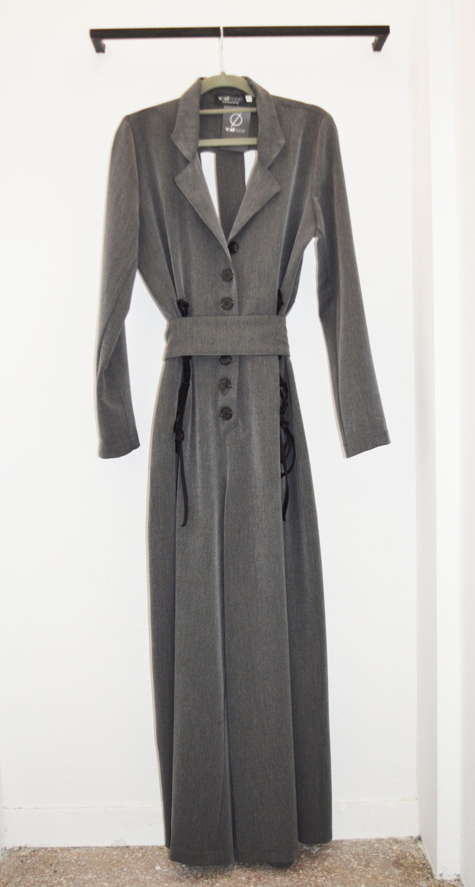 Wide leg overall with  stripe patterned cut out in  the back