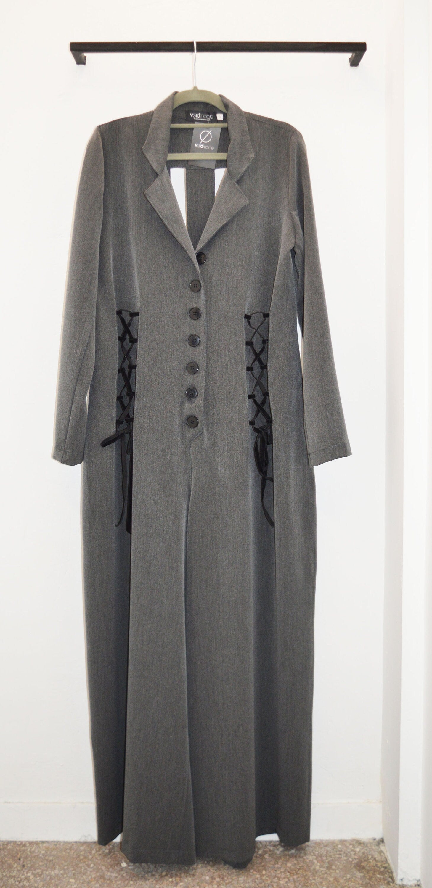 Wide leg overall with  stripe patterned cut out in  the back