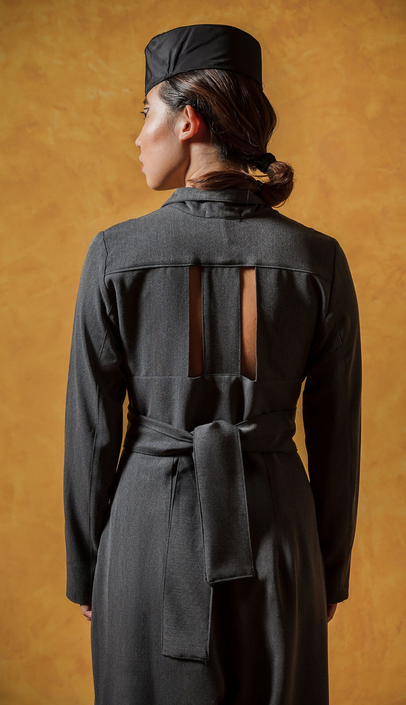 Wide leg overall with  stripe patterned cut out in  the back