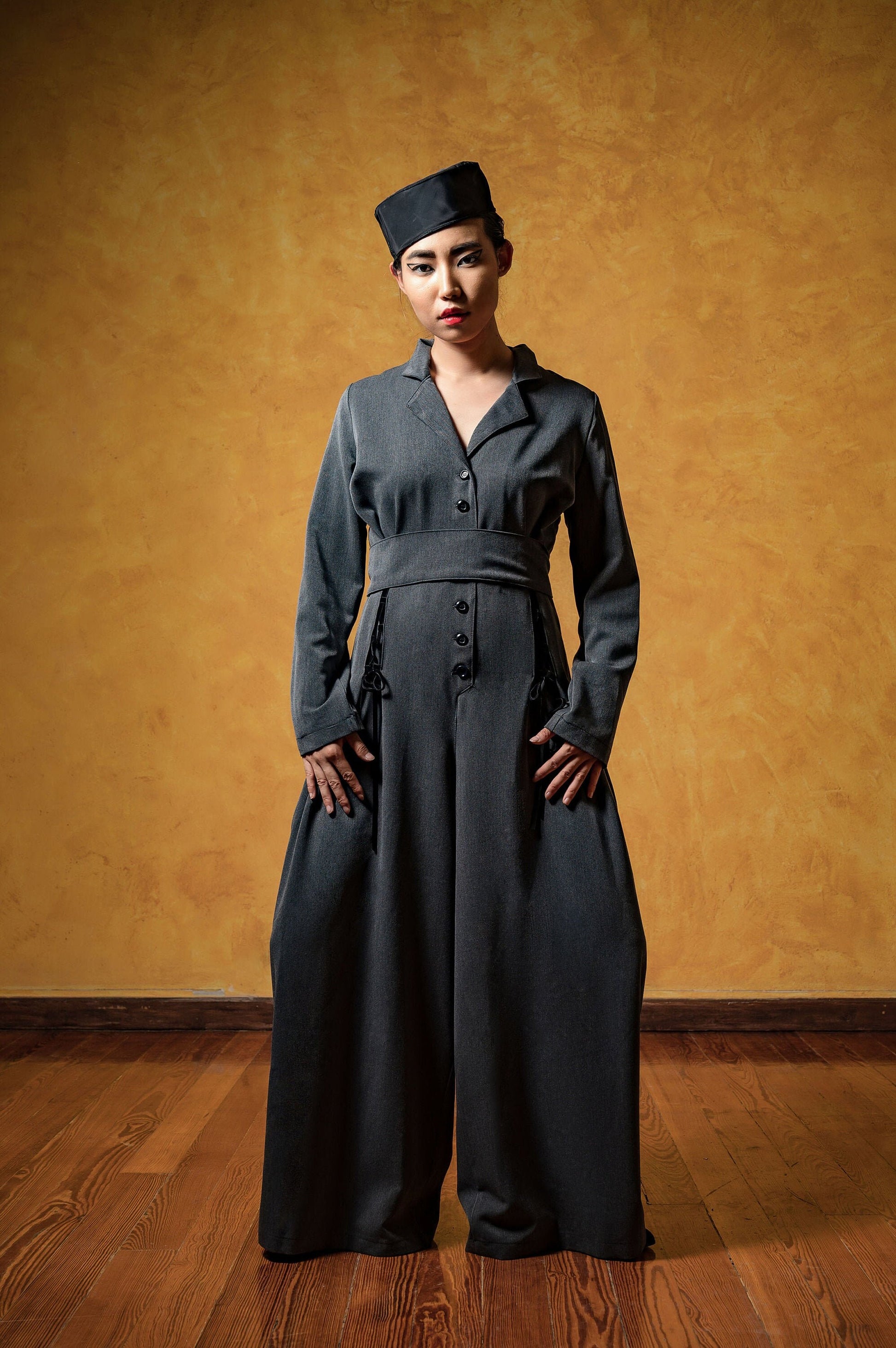 Wide leg overall with  stripe patterned cut out in  the back