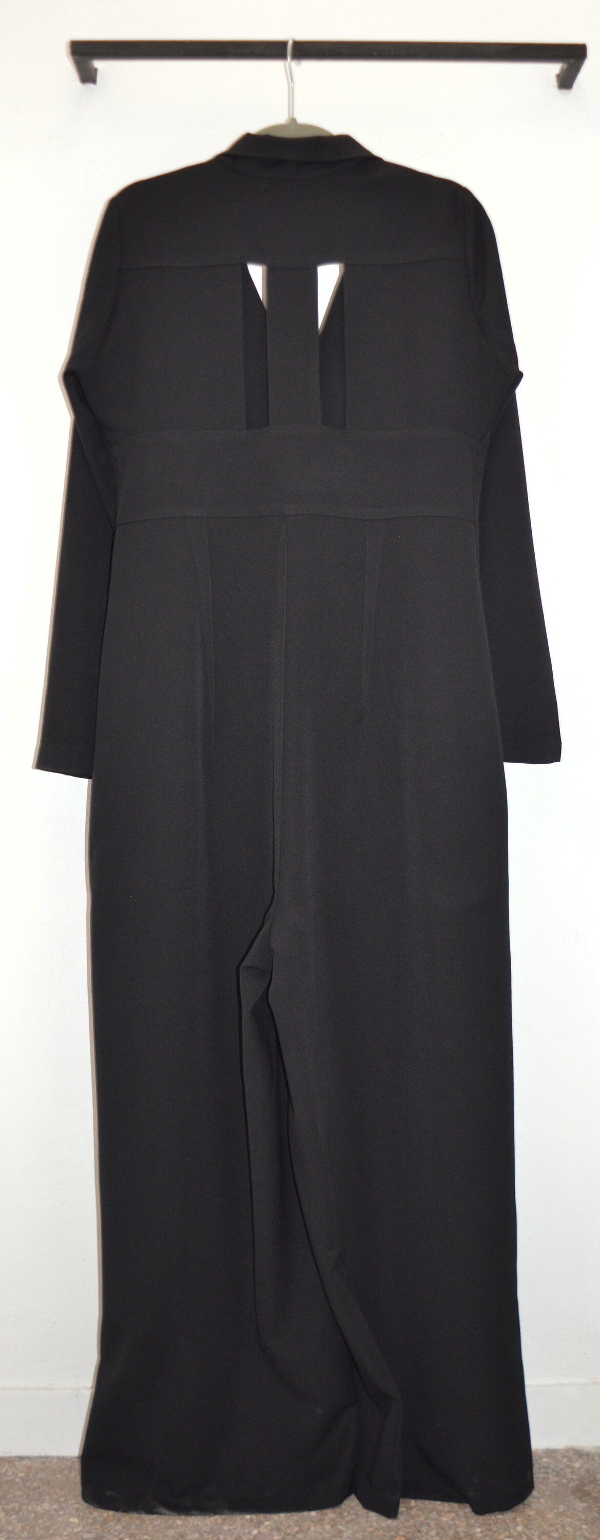 Wide leg overall with  stripe patterned cut out in  the back