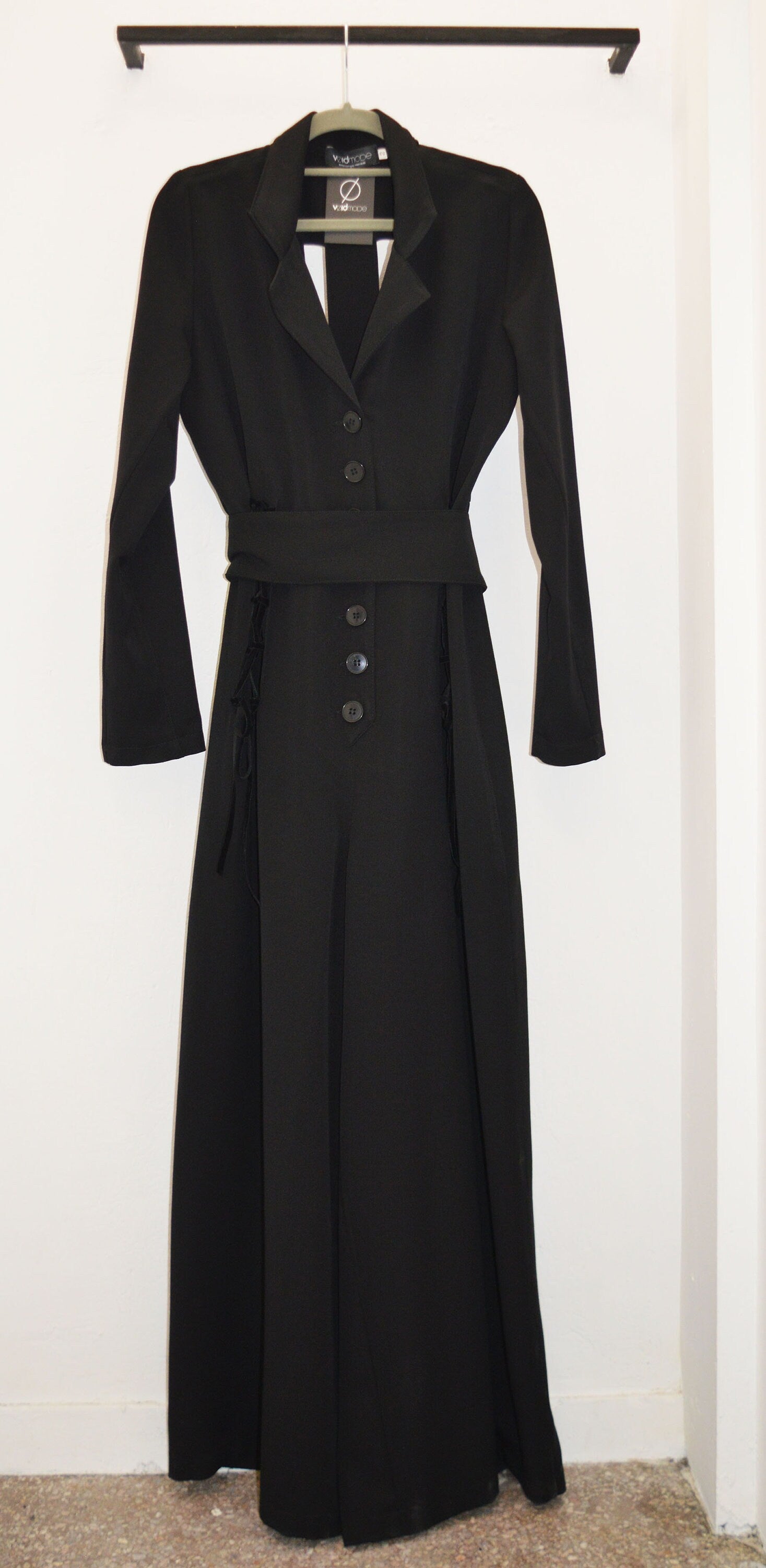 Wide leg overall with  stripe patterned cut out in  the back